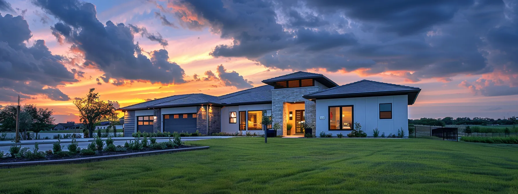 a modern suburban home at dusk, illuminated by warm exterior lighting, stands amidst a serene neighborhood with a neatly maintained lawn, under a slightly cloudy sky that suggests the impending need for reliable backup power.